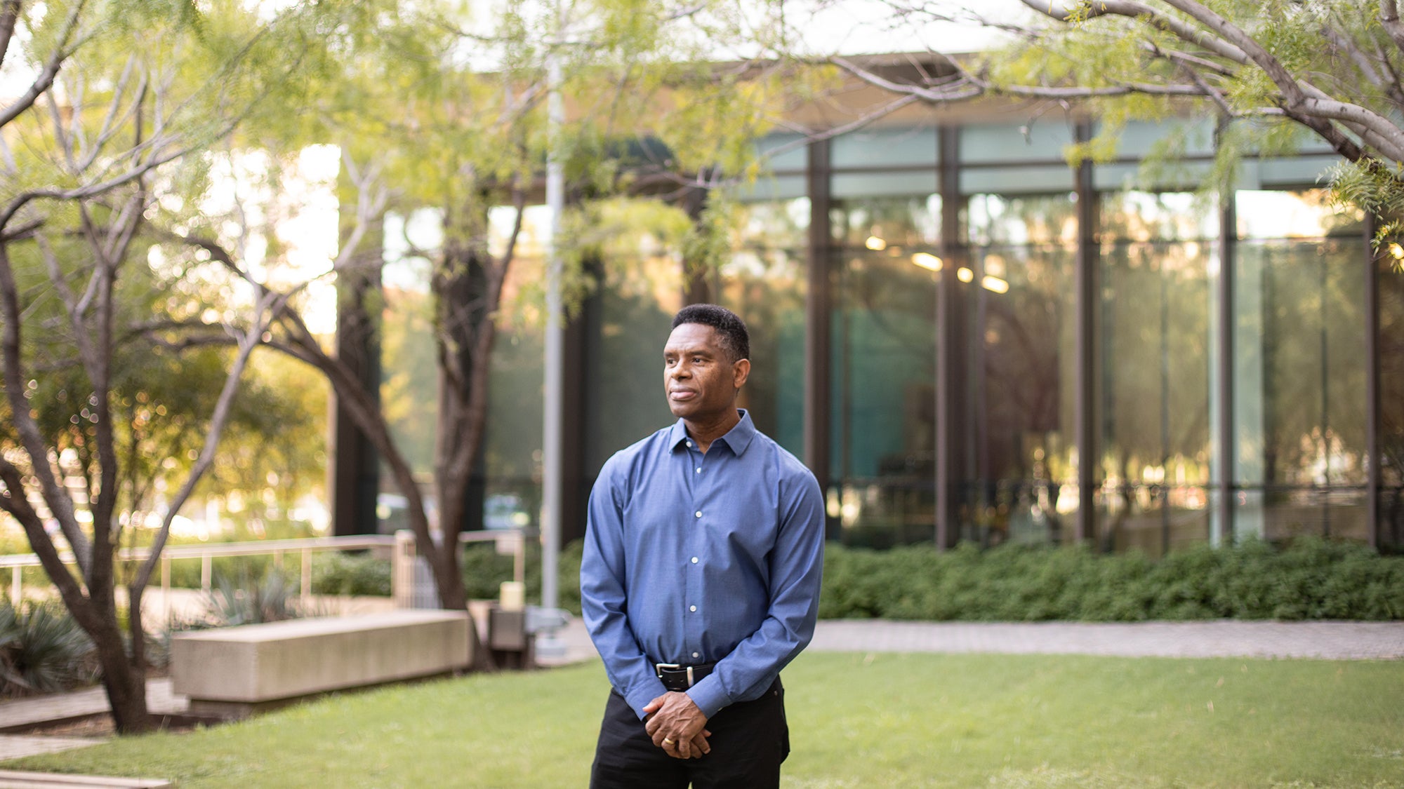 Craig Watkins portrait in courtyard at sunset