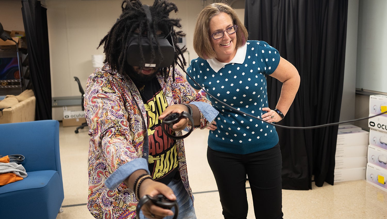 Faculty and student interact during Texas Immersive event