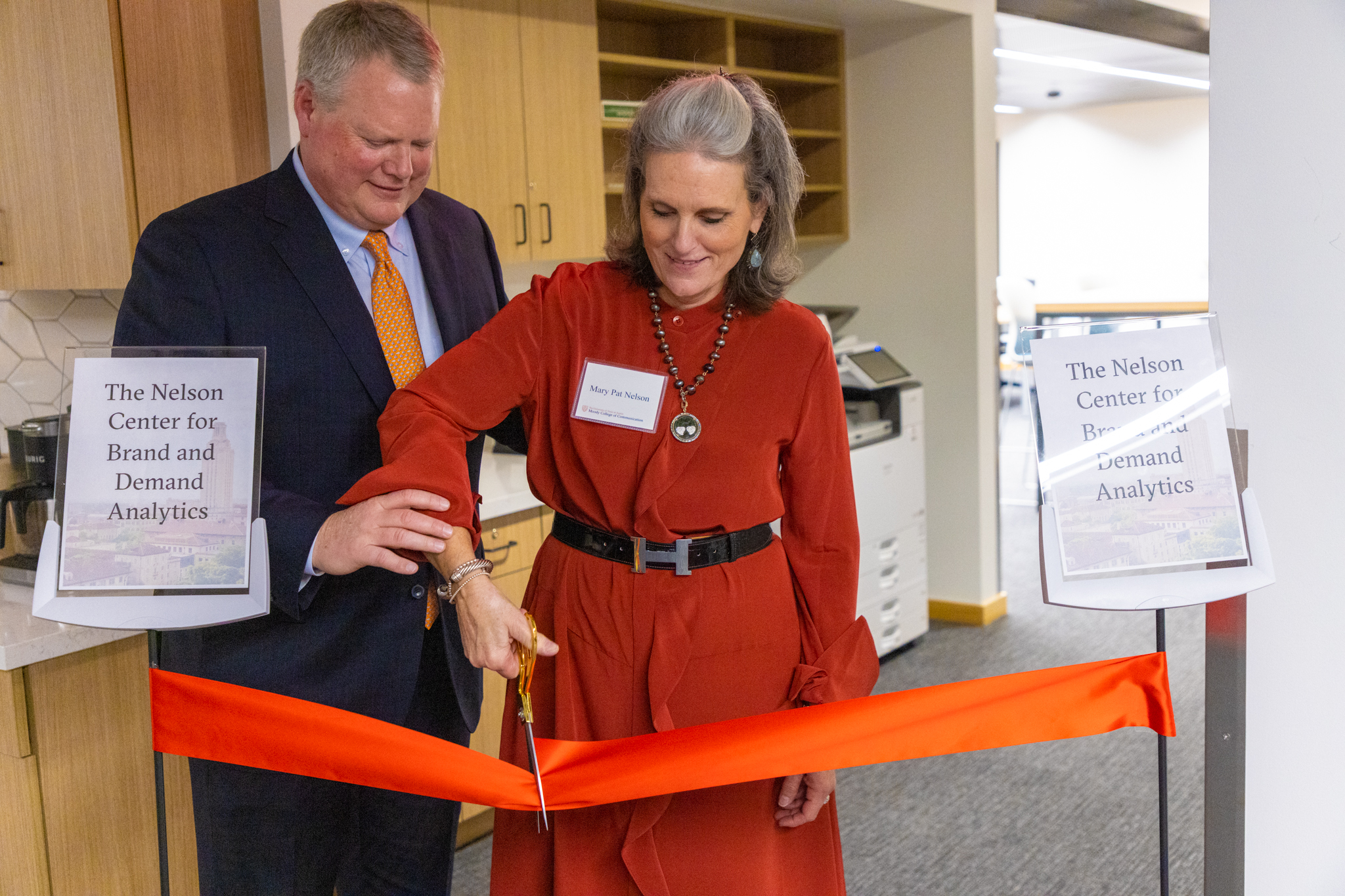 Jim and Mary Pat Nelson at a ribbon-cutting for the new Nelson Center for Brand and Demand Analytics