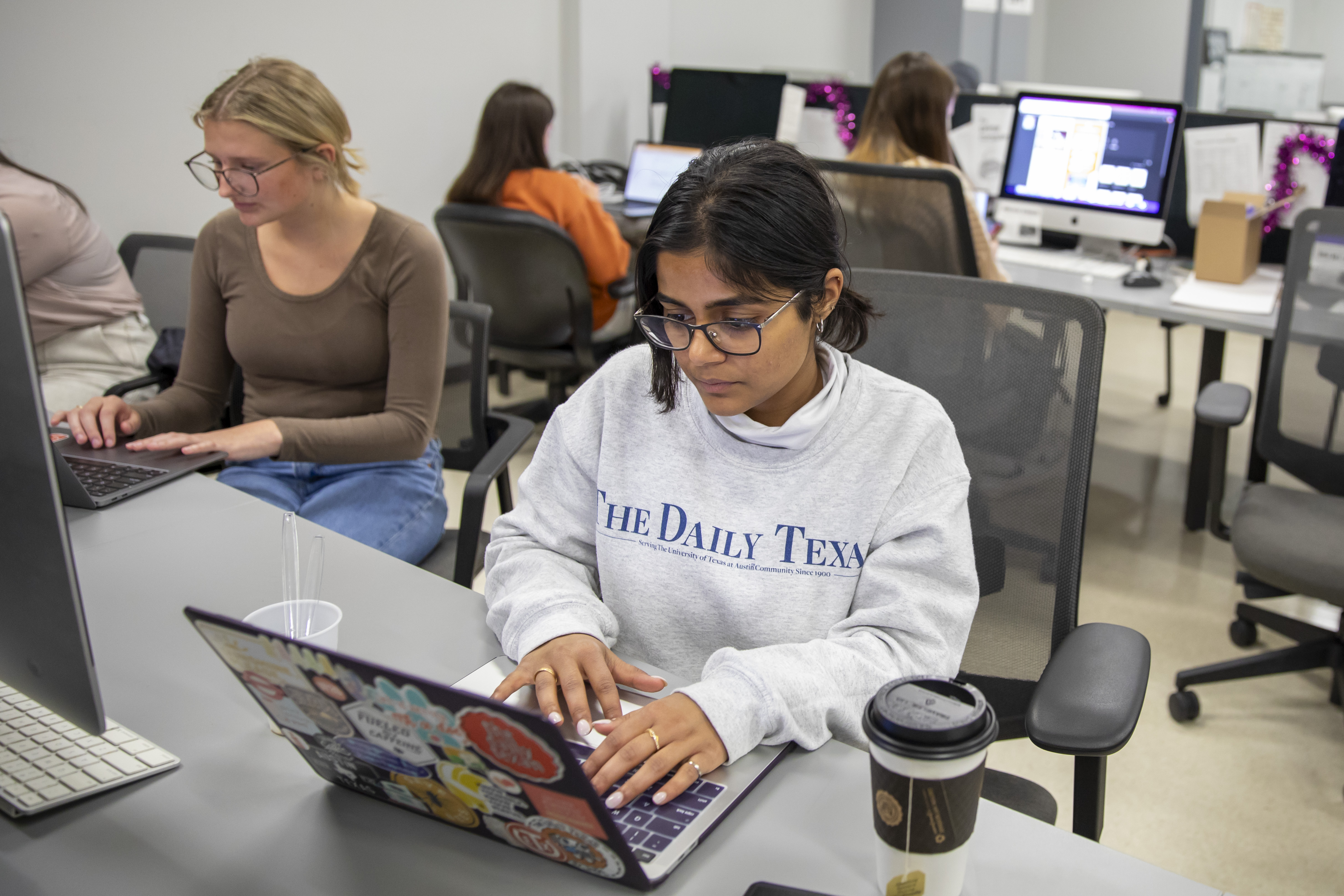student working for daily texan