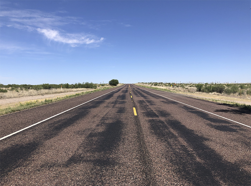 photo of west Texas road and blue sky 