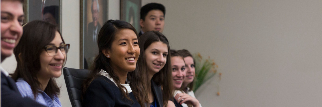 a group of young students smiling as they participate in the 2015 Campaign Bootcamp event