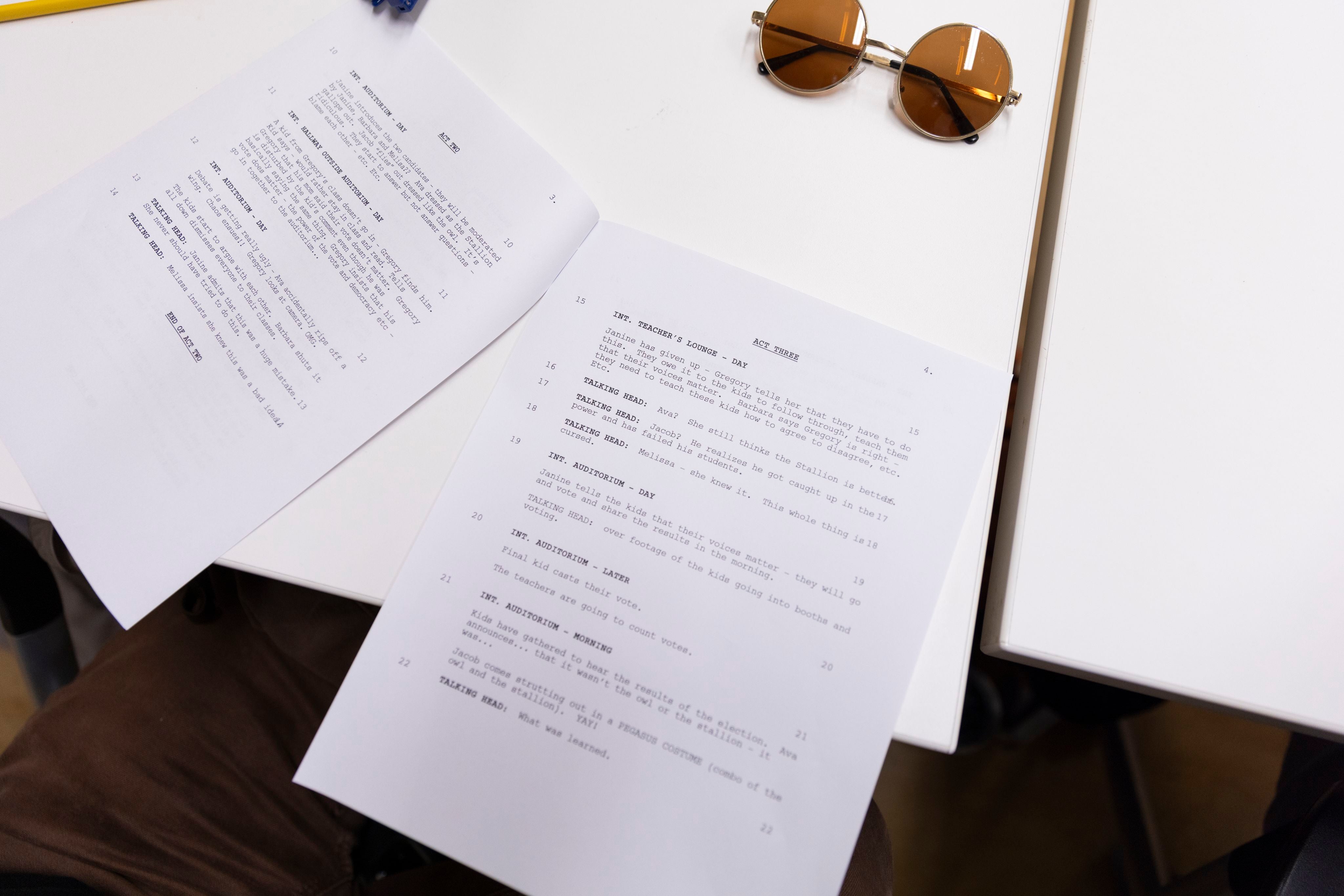 An eye bird view of the script on a desk 