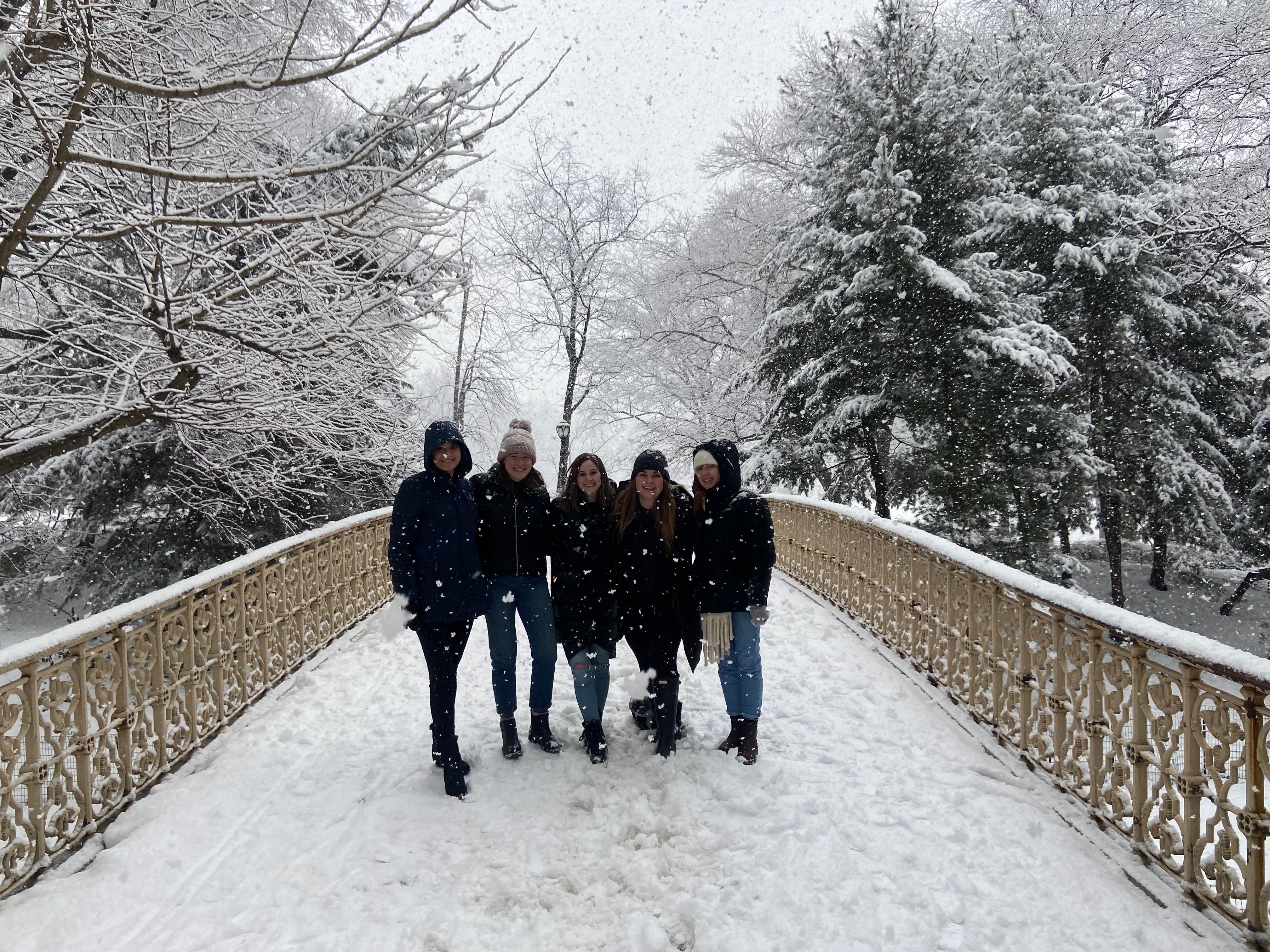 group of students standing in the snow