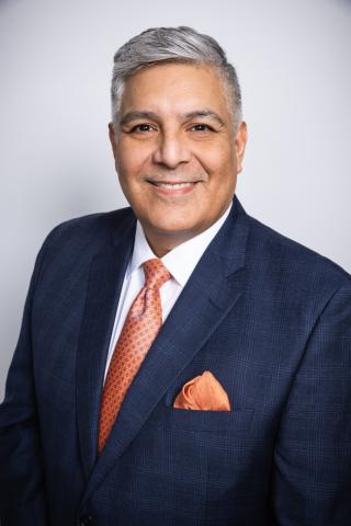 Headshot of Jon G. Muñoz