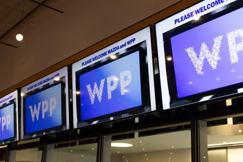 Photo of WPP logo on TV screens