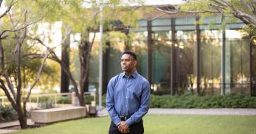 Craig Watkins portrait in courtyard at sunset