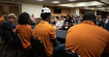 Texas high school students interview UT Austin athletes.