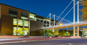 Moody College bridge at night
