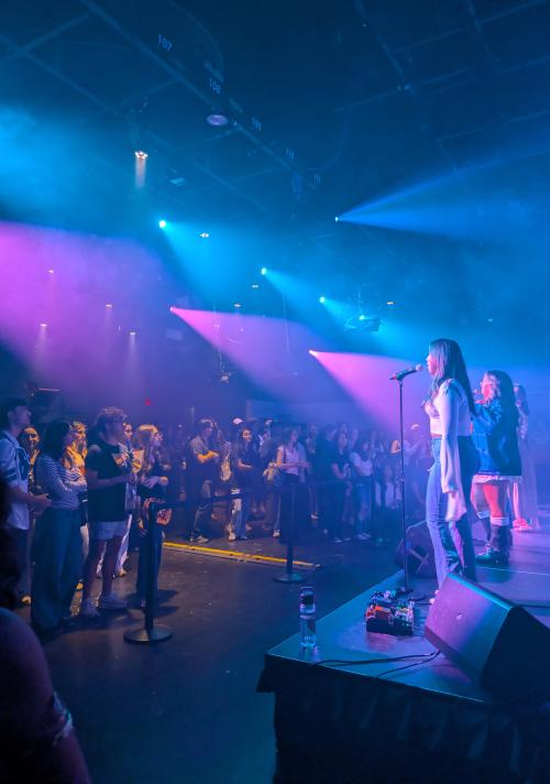 Student performers on stage 