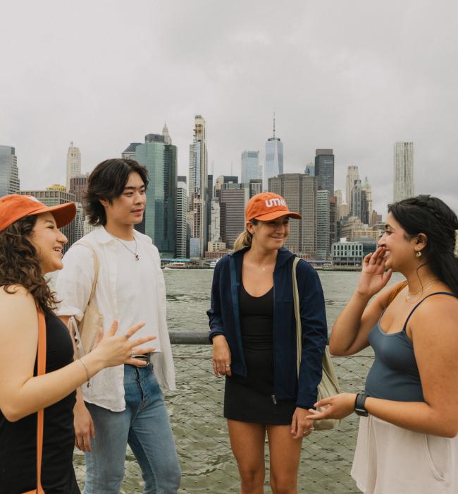 Students near water in New York City