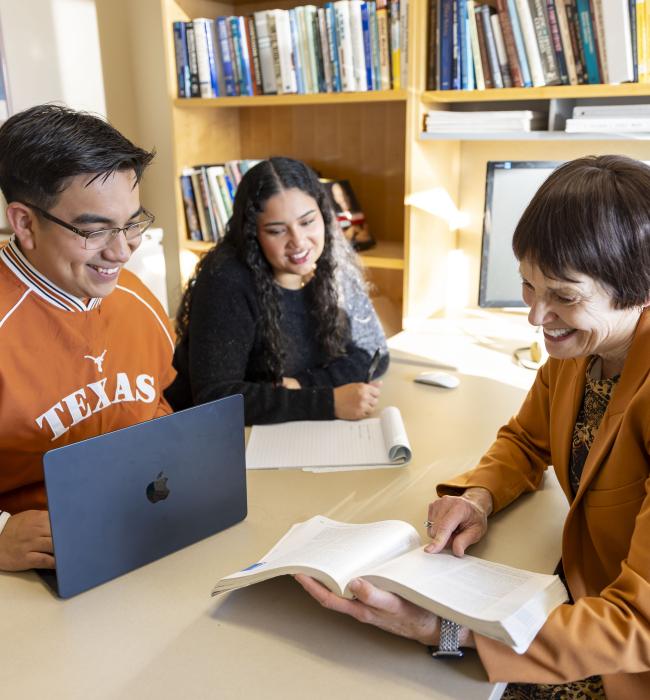 Meme Drumwright with students in office