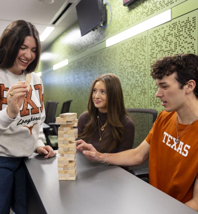 Students playing jenga