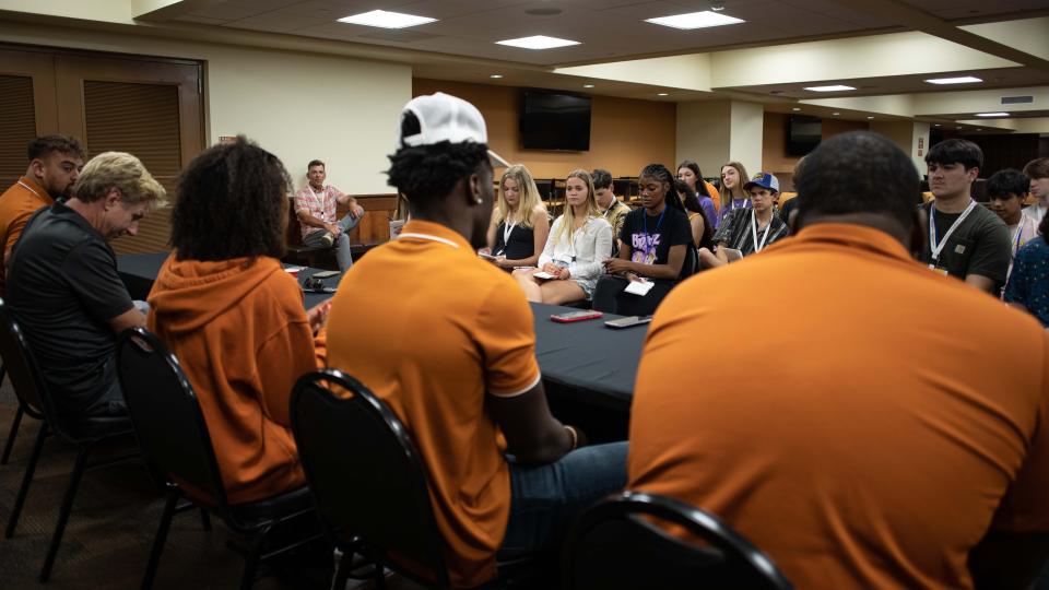 Texas high school students interview UT Austin athletes.