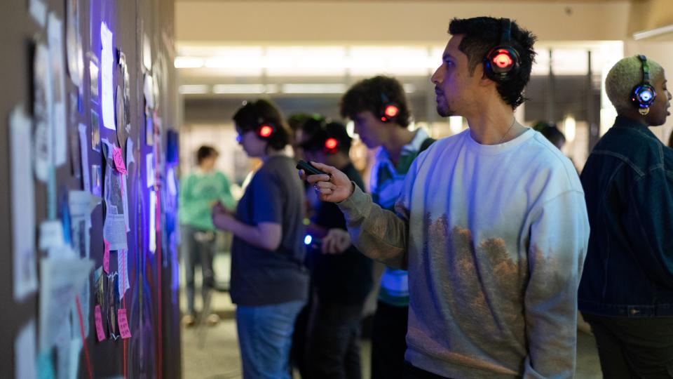 student at the pulse playtest wearing headphones