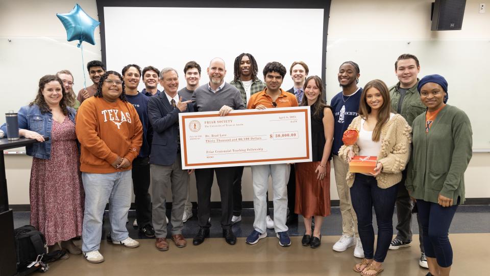 Dr. Brad Love presented with Friar Society award
