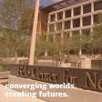 Screenshot of the Moody Landing page video featuring Belo building and the words "converging worlds, creating futures"