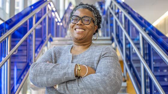 Natalie Tindall portrait inside Moody College complex