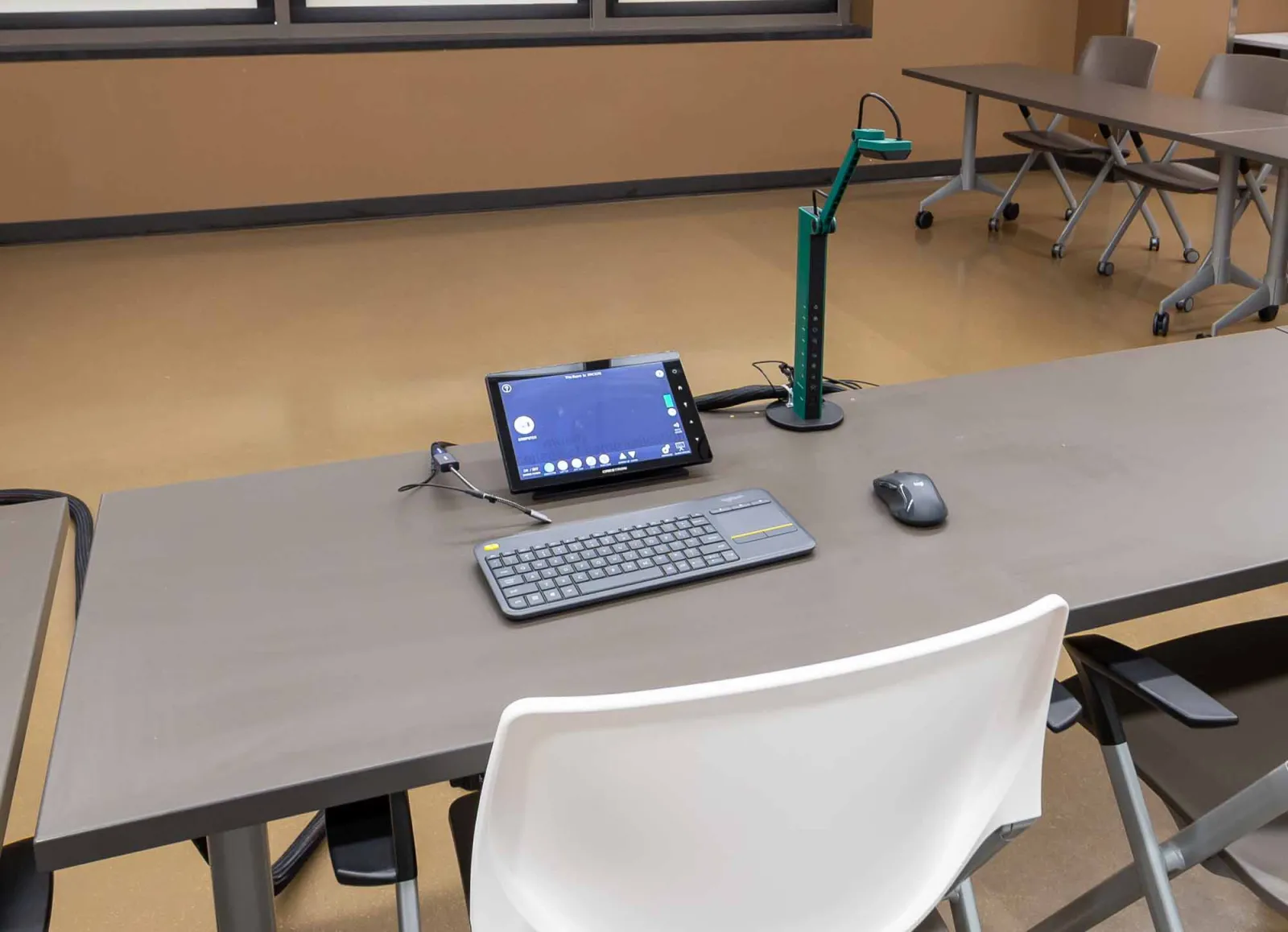 closeup of teaching station in DMC 3.210 showing touchpanel, doccam, and wireless keyboard/mouse