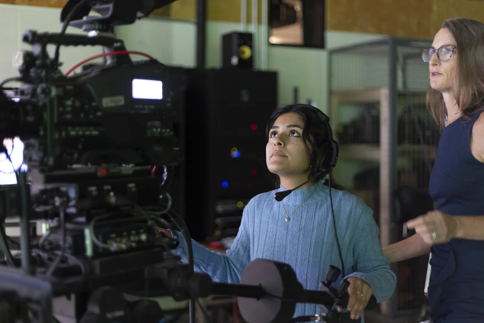Student using a broadcast camera