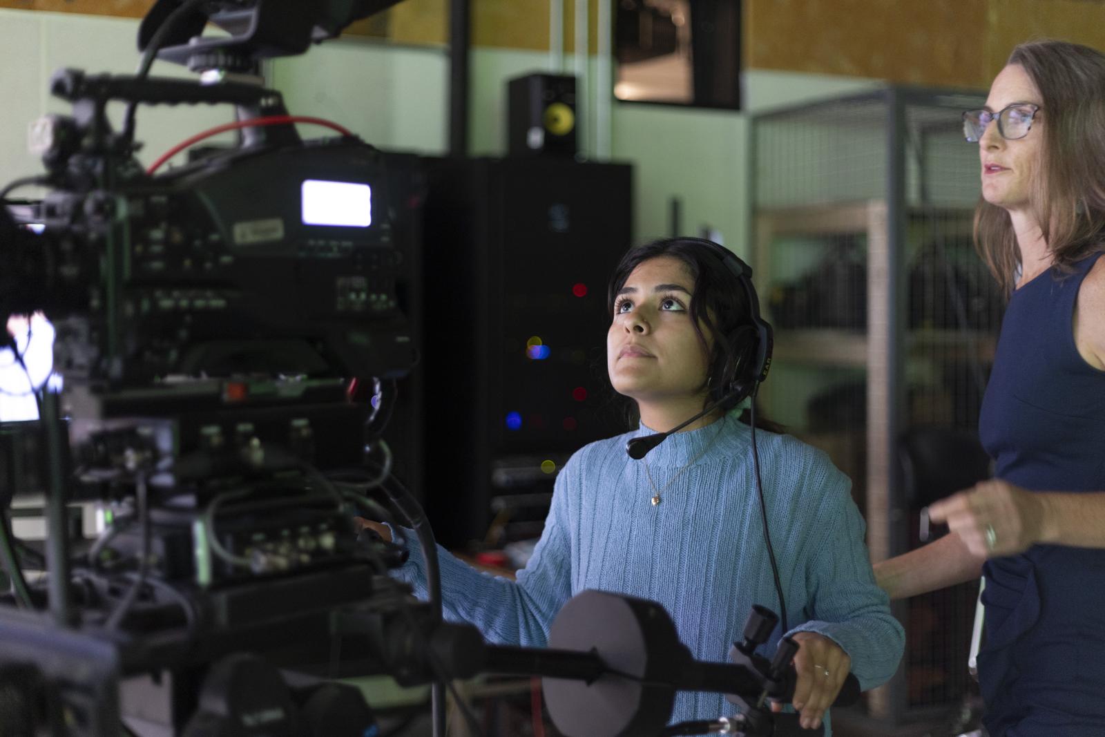 Student using a broadcast camera 