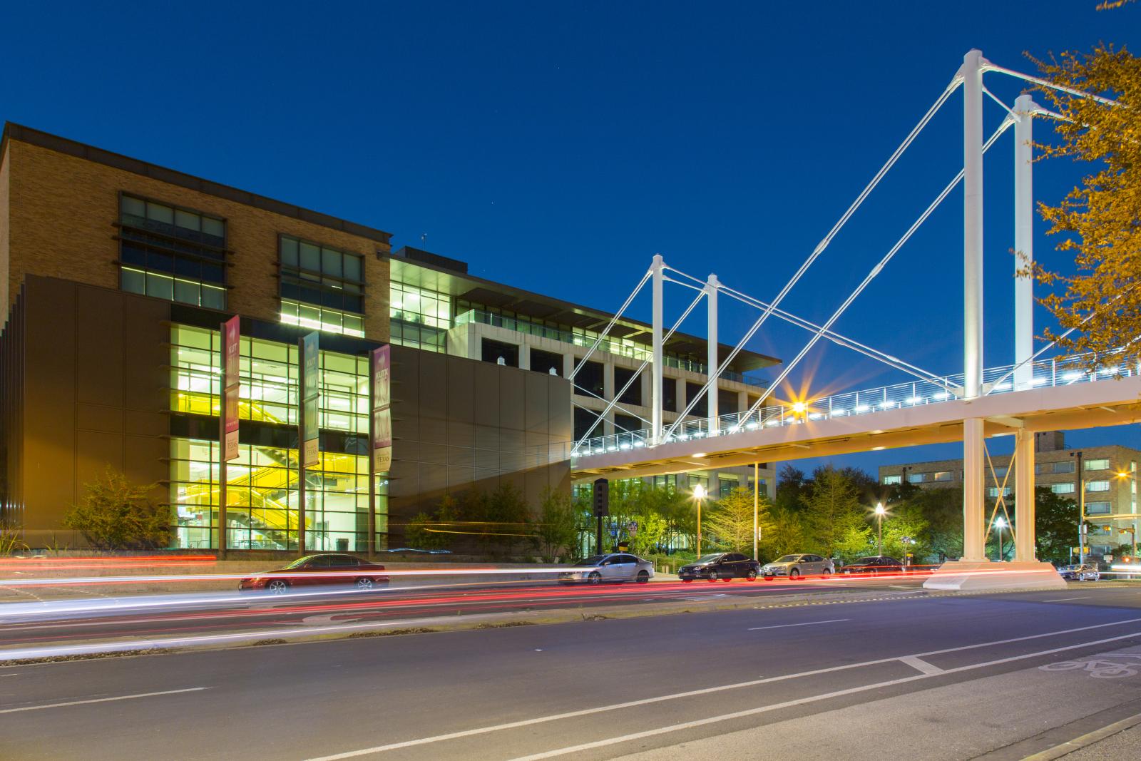 Moody College bridge at night