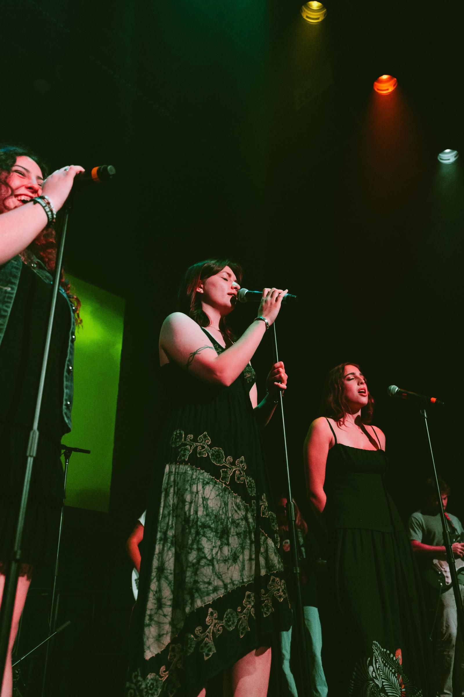 Students singing on stage