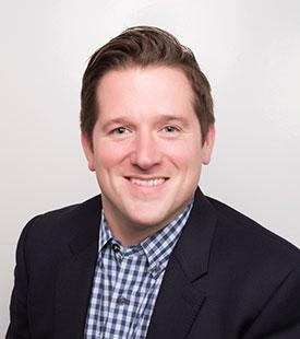 Headshot of Reid Whitaker