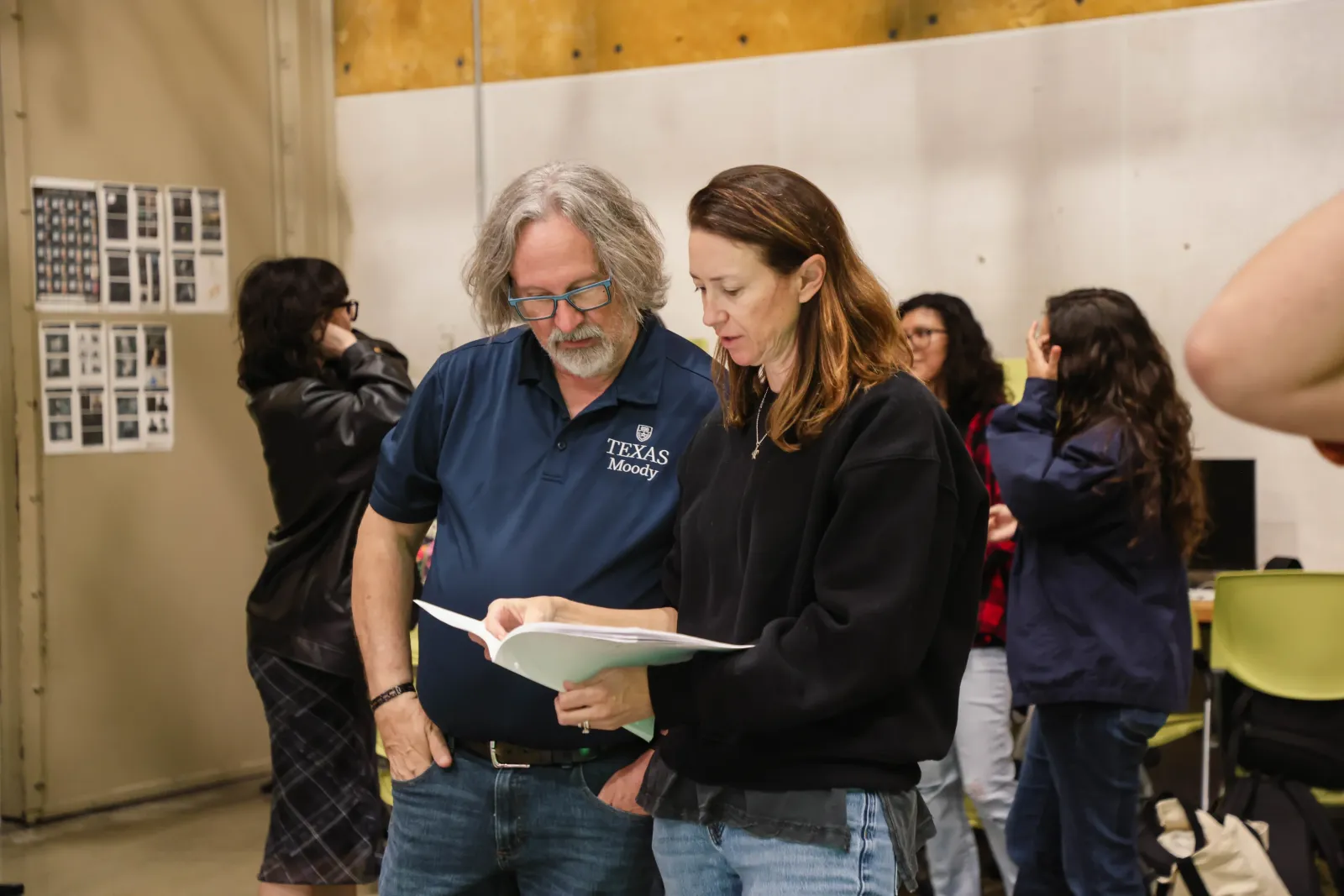 McCreery and Schneider review a script. Photo by Ivan Rocha