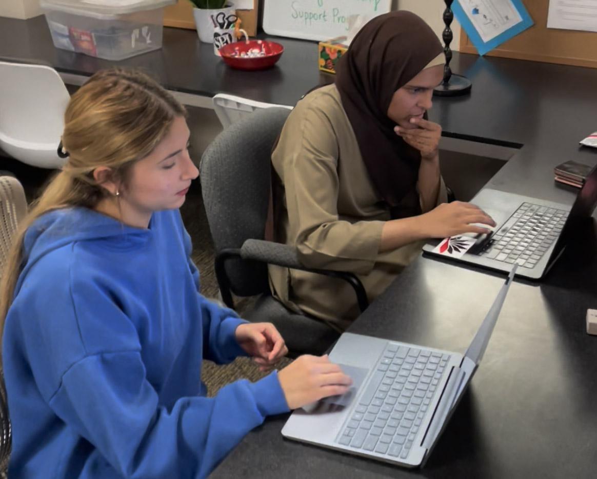 Two students working on computers
