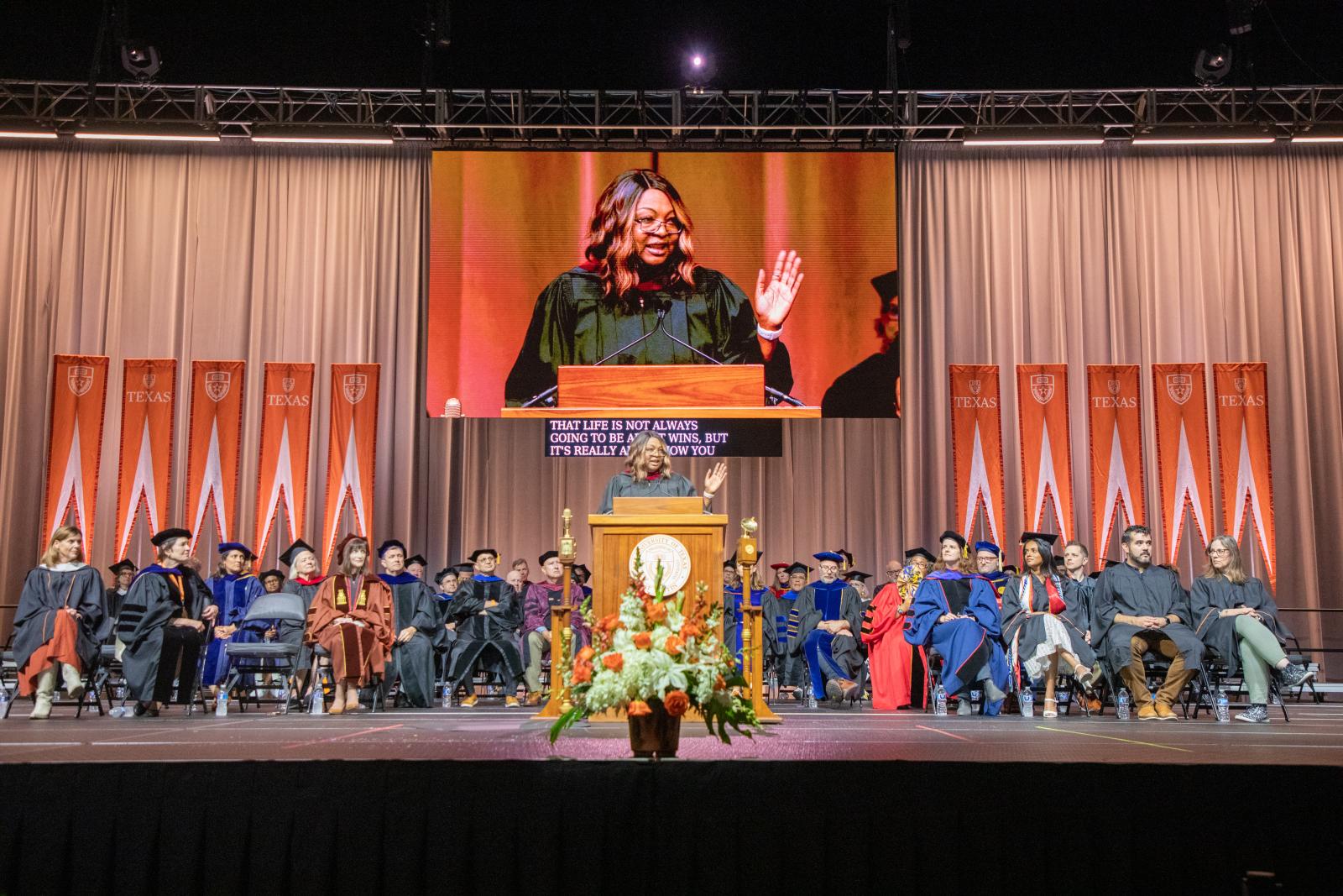Photo of Fran Harris speaking at graduation 2026
