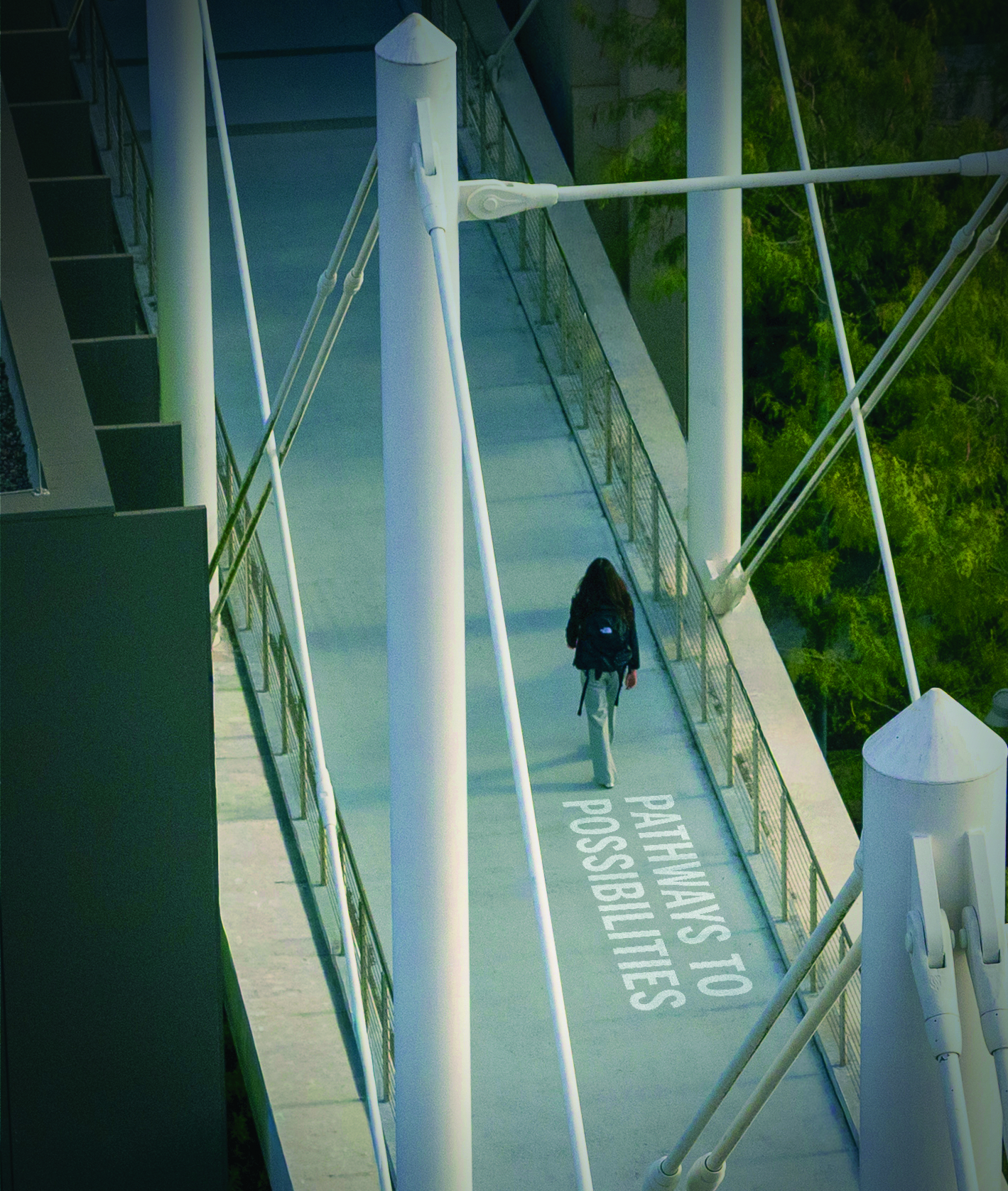 A student walks along an elevated Moody College walkway marked “Pathways to Possibilities,” framed by white columns and cables.