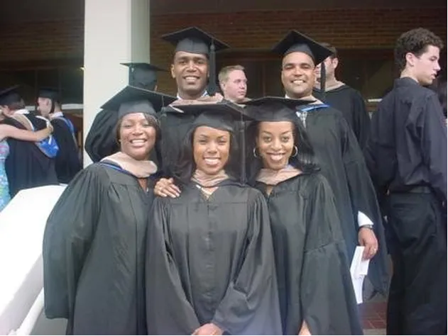 Tammy Smithers and four fellow Black Rice MBA graduates pose after commencement.