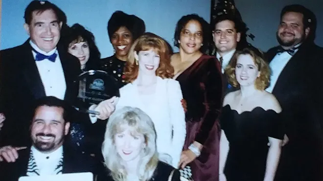 Tammy Smithers in group photograph after winning team award.