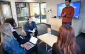 five students working together
