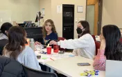 Student adding a "cent" during a 2 cents activity