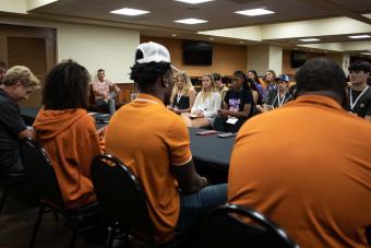Texas high school students interview UT Austin athletes.