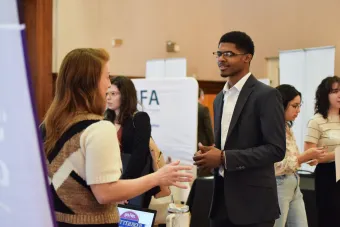 Student listens to a recruiter