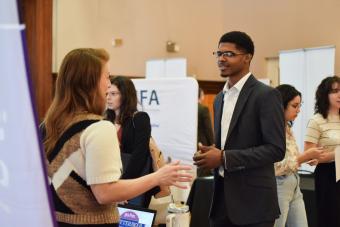 Student listens to a recruiter