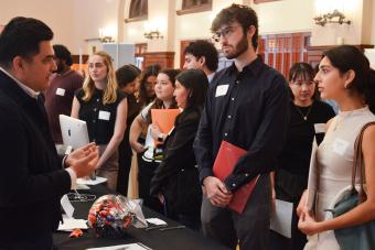 Group of students listen to a recruiter