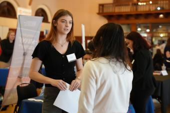 Student listens to a recruiter