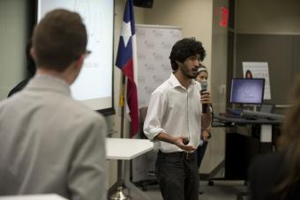Student talking on mic