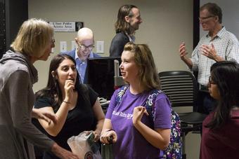 Students engaging with faculy and guest lecuturers