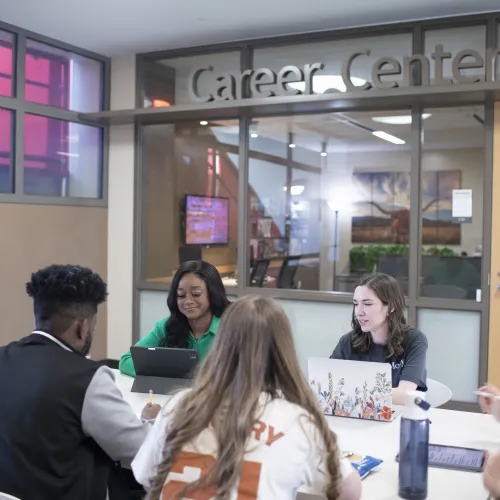 students in front of career center