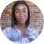 Headshot of Asha Thompson, Sr. Graphic Designer at the CHC
