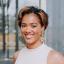 This is a professional headshot of Okirah Harris. 