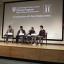 David Wallace Wells was the year’s featured speaker. Moody honors student Emily Anaya, pictured with microphone, joined Wells and other students on stage for a follow-up panel discussion.