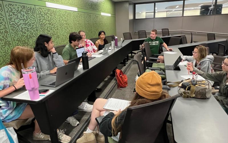 Two student teams complete peer review