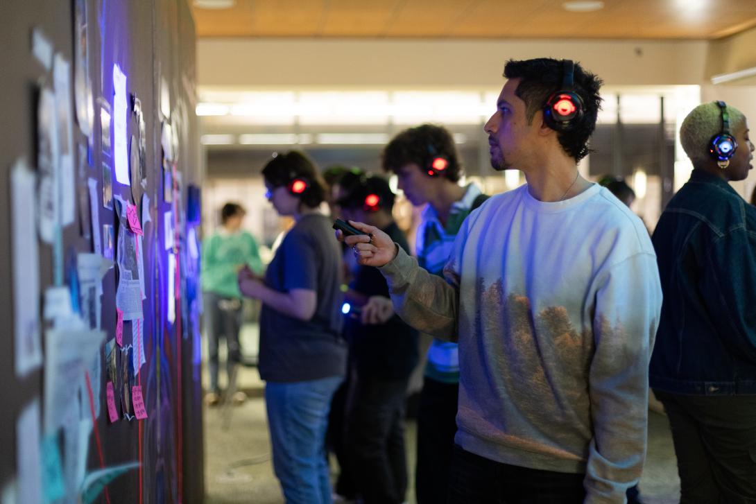 student at the pulse playtest wearing headphones