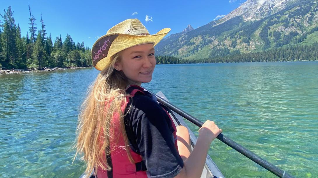 student kayaking 